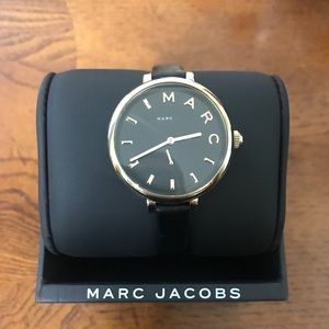 Black leather and gold detail watch.